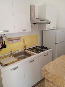 A cozinha ou kitchenette de E case tu Bertu