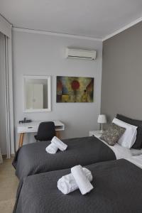 Posteľ alebo postele v izbe v ubytovaní C.L.A. 2 City Lux Apartment Alaxandroupoli