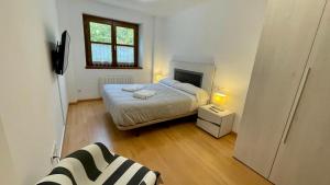 Postel nebo postele na pokoji v ubytování B20 - Resid. La Coma 1º - Villmor
