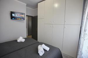 Posteľ alebo postele v izbe v ubytovaní C.L.A. 2 City Lux Apartment Alaxandroupoli