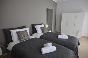 Posteľ alebo postele v izbe v ubytovaní C.L.A. 2 City Lux Apartment Alaxandroupoli
