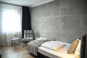 Postel nebo postele na pokoji v ubytování Hotel Zum Weissen Ross