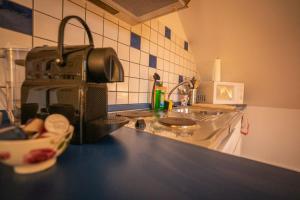 Kuchyň nebo kuchyňský kout v ubytování Gemütliches Apartment im wunderschönen Kallmünz + 10 fotografií