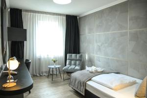 Postel nebo postele na pokoji v ubytování Hotel Zum Weissen Ross