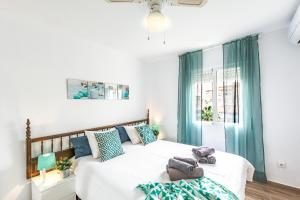 Posteľ alebo postele v izbe v ubytovaní Andaluz Apartments - Laguna Beach