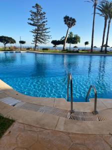 Bazén v ubytování Carré D OR au santa Clara torremolinos nebo v jeho okolí