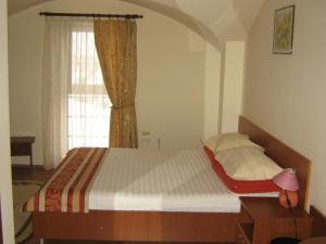 Postel nebo postele na pokoji v ubytování Hotel Transit