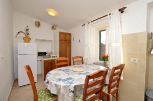 Kuchyň nebo kuchyňský kout v ubytování Apartment Stari Grad