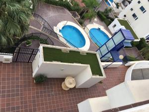 Bazén v ubytovaní 2 Paradise of Benalmádena Residencial Los Patos II a 300 metros de la playa y supermercados, wifi gratis, vistas a la montaña alebo v jeho blízkosti