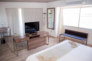 TV o dispositivi per l'intrattenimento presso 7 Saltos Resort