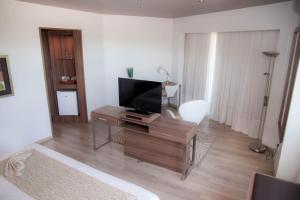 TV o dispositivi per l'intrattenimento presso 7 Saltos Resort