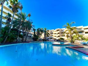 The swimming pool at or close to Apartamento para 6 a 5 min Port Aventura en Hotel Festival Village