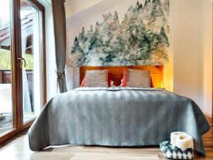 En eller flere senge i et værelse på Przystanek Góry