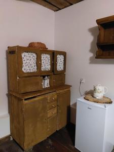 two old trunks are stacked on top of a washing machine at Agroturystyka LipoweWzgórze- Jaś&Małgosia in Tereszpol