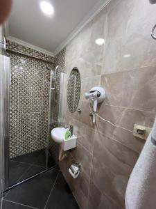 A bathroom at PALMERA ART HOUSE