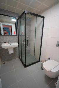 Koupelna v ubytování Hotel Amore