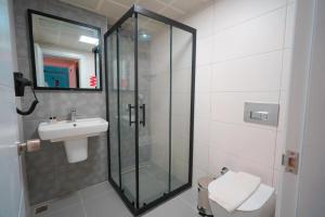 Koupelna v ubytování Hotel Amore