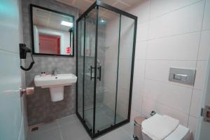 Koupelna v ubytování Hotel Amore