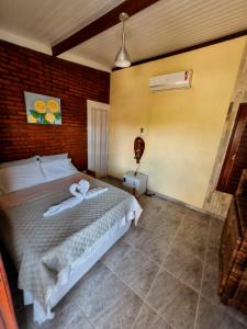 Aloha Beach Guest House客房内的一张或多张床位