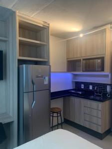 Una cocina o zona de cocina en Conforto Frei Caneca M602