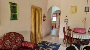 Posezení v ubytování LOST WORLD OF TAMBUN HOMESTAY + 24 fotografií