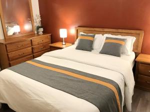 Postelja oz. postelje v sobi nastanitve Duncan Motel