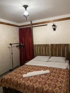 Postel nebo postele na pokoji v ubytování Mini Hostel N.Tigranyan 5