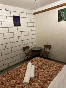 Postel nebo postele na pokoji v ubytování Mini Hostel N.Tigranyan 5