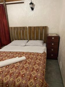 Postel nebo postele na pokoji v ubytování Mini Hostel N.Tigranyan 5