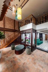 A seating area at Lotusama Hanoi Hotel