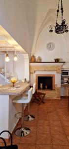 A kitchen or kitchenette at Guglielmo Tell Suite