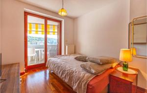 Ένα ή περισσότερα κρεβάτια σε δωμάτιο στο Beautiful Apartment In Portoroz