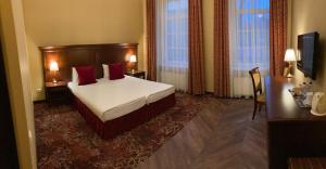 Postel nebo postele na pokoji v ubytování Guest House Pirklių Namai