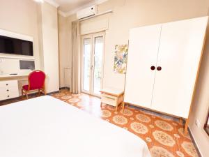 A bed or beds in a room at Donna Felì