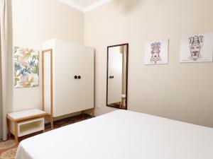 A bed or beds in a room at Donna Felì