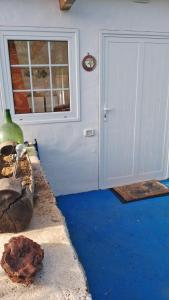 a room with a door and a window at Finca Cosmos in El Paso