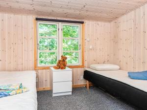 Postel nebo postele na pokoji v ubytování Holiday home Ebeltoft CCIII
