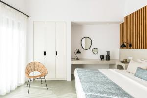 Кровать или кровати в номере Santo Pure Oia Suites & Villas