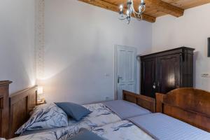 Posteľ alebo postele v izbe v ubytovaní House Grandići 1852