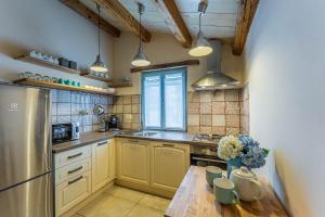 Kuchyňa alebo kuchynka v ubytovaní House Grandići 1852