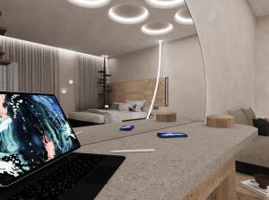 Televízia a/alebo spoločenská miestnosť v ubytovaní Brilliance of Mykonos