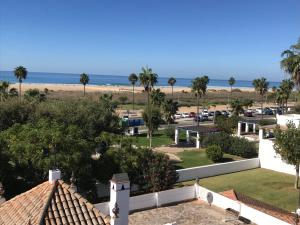 a view of the beach from a house at CONIL frente a la playa Carril De la Fuente in Conil de la Frontera