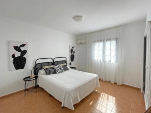 Posteľ alebo postele v izbe v ubytovaní Villa Charlotte