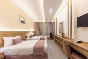 TV a/nebo společenská místnost v ubytování Hotel 21 Makkah
