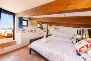 A bed or beds in a room at Finca Pep