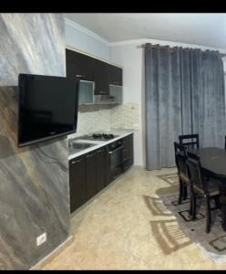 Η κουζίνα ή μικρή κουζίνα στο Nova Apartments two balcony