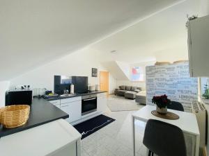 Η κουζίνα ή μικρή κουζίνα στο Ferienwohnung Casa Blanca