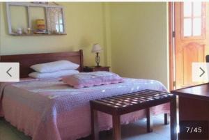 Postel nebo postele na pokoji v ubytování Le Petit Clos
