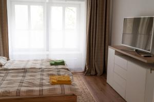 Voodi või voodid majutusasutuse Dana's Apartment beim Augarten toas