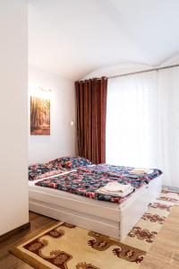 Voodi või voodid majutusasutuse Dana's Apartment beim Augarten toas